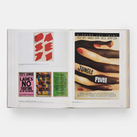 Open page of graphic design classics displaying vintage-style posters with bold text and graphics.