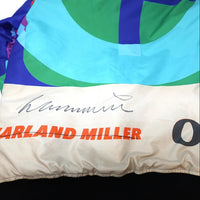 Colorful jacket with 'Harland Miller' signature on a white background
