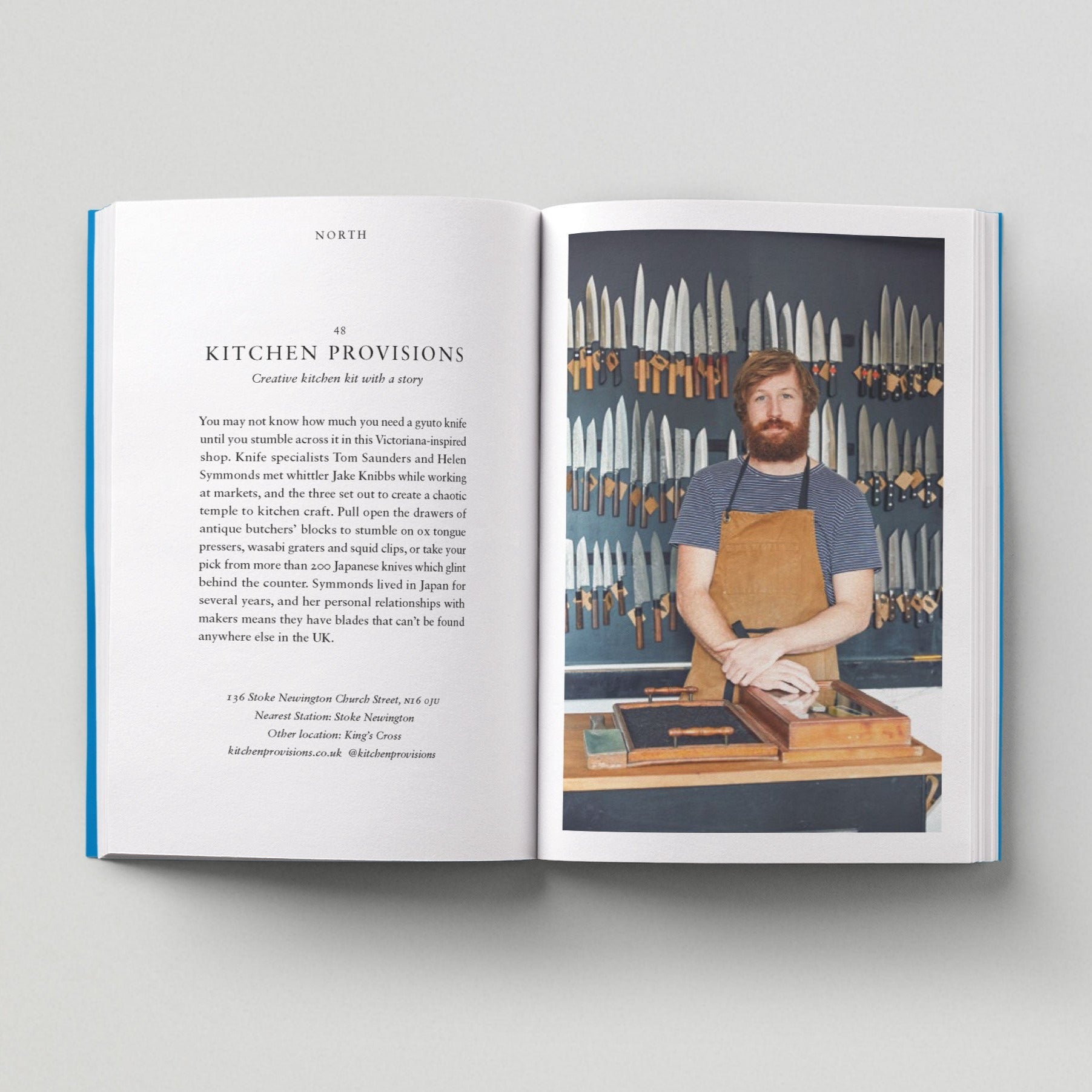 Open page of Independent London book featuring a photograph of a person standing in front of a wall of kitchen knives.