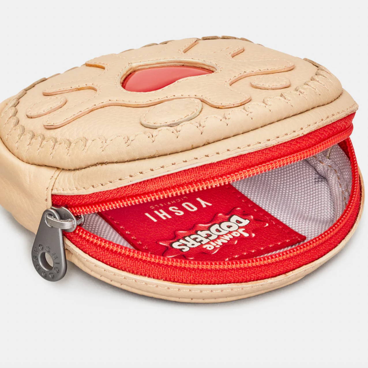 Jammy dodger biscuit shaped leather purse open zipper close up