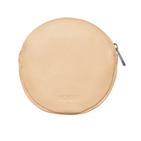 The back of a Jammie Dodgers biscuit shaped leather purse.