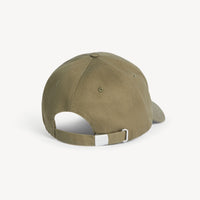 Green baseball cap on a white background