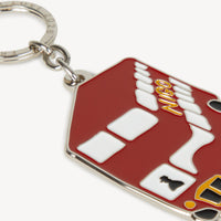 Red double-decker bus keyring on a white background