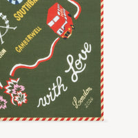 Green bandana with text and illustrations on a white background