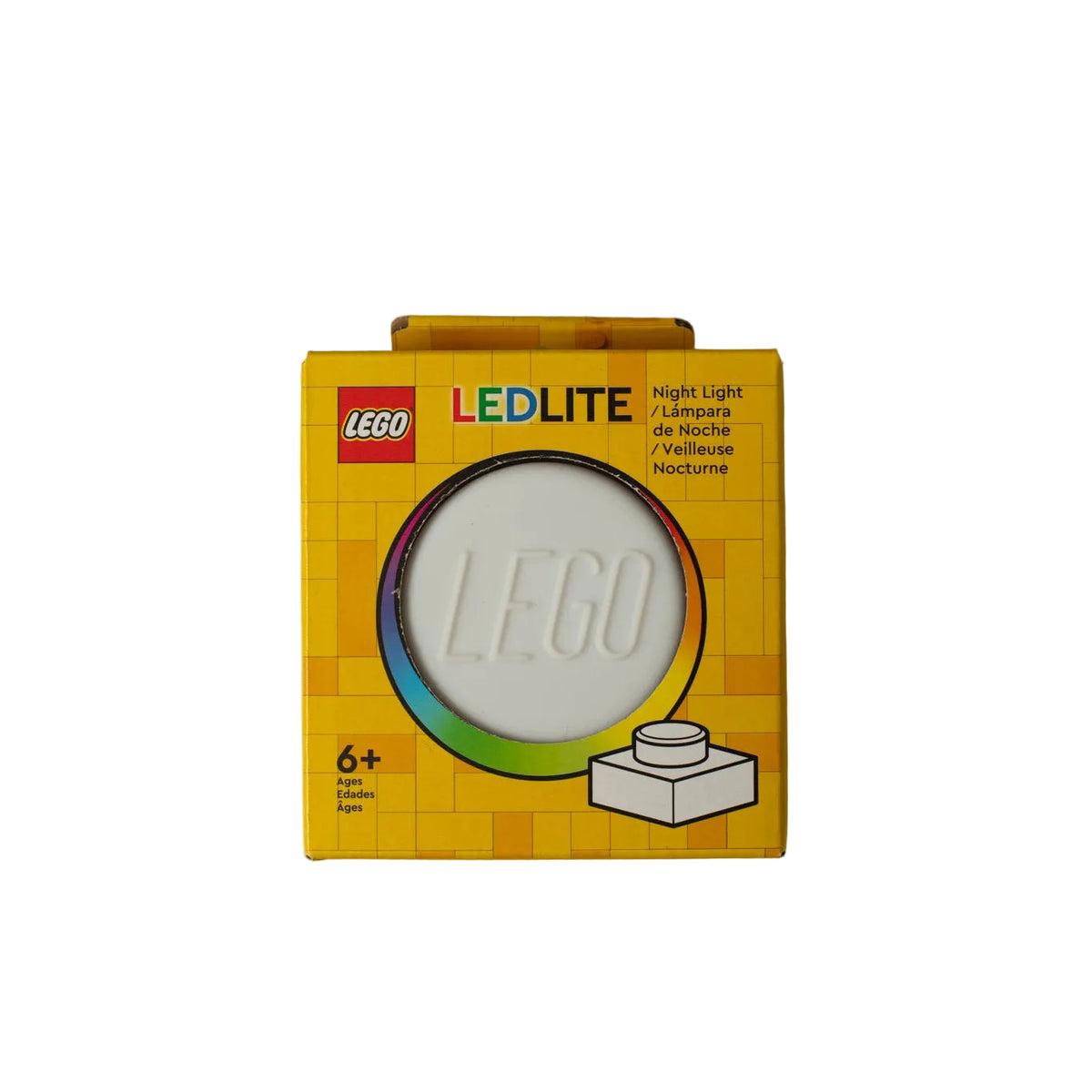 LEGO LEDLite magic light toy light in its original yellow box, shown against a solid pale yellow background.