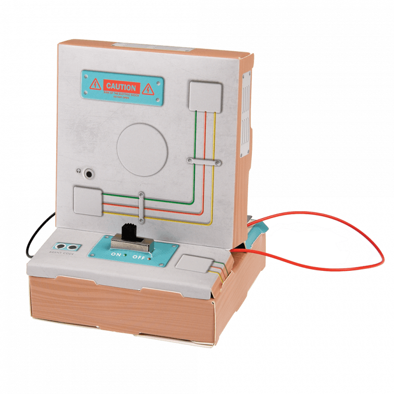 Small electronic device with wiring and a power switch on a green background