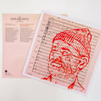 Greeting card with red illustration of a person wearing a beanie on sheet music background