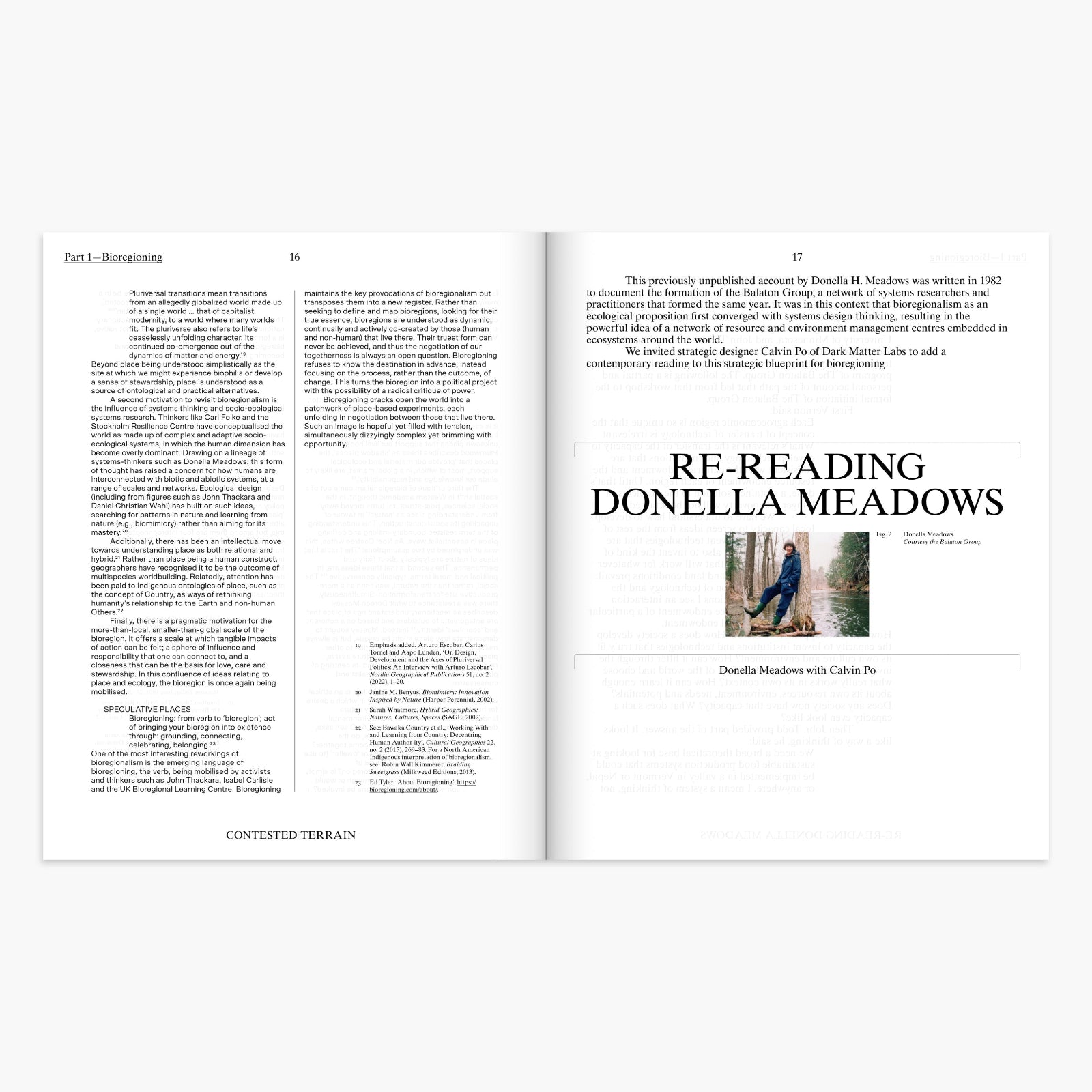 An open book spread showing printed pages with text and a small inset photo titled 'RE-READING DONELLA MEADOWS' on the right page, photographed against a light gray background.