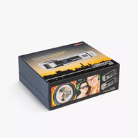 Cassette tape with a box featuring a cityscape design on a white background