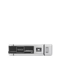 Vintage silver camera on a white background
