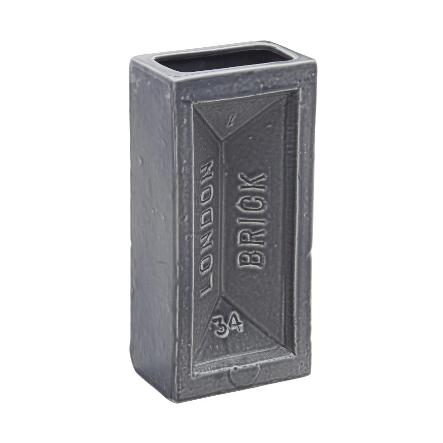 Grey brick shaped ceramic vase with the words 'London Brick' on the side.