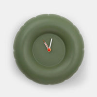 A round green minimalist designed clock