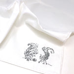 Close-up of a squirrel illustration on a napkin