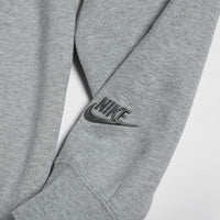 Gray Nike sweatshirt with logo on a light gray background