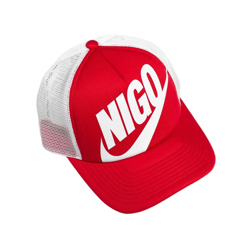 Red and white cap with 'NIGO' logo on a light gray background