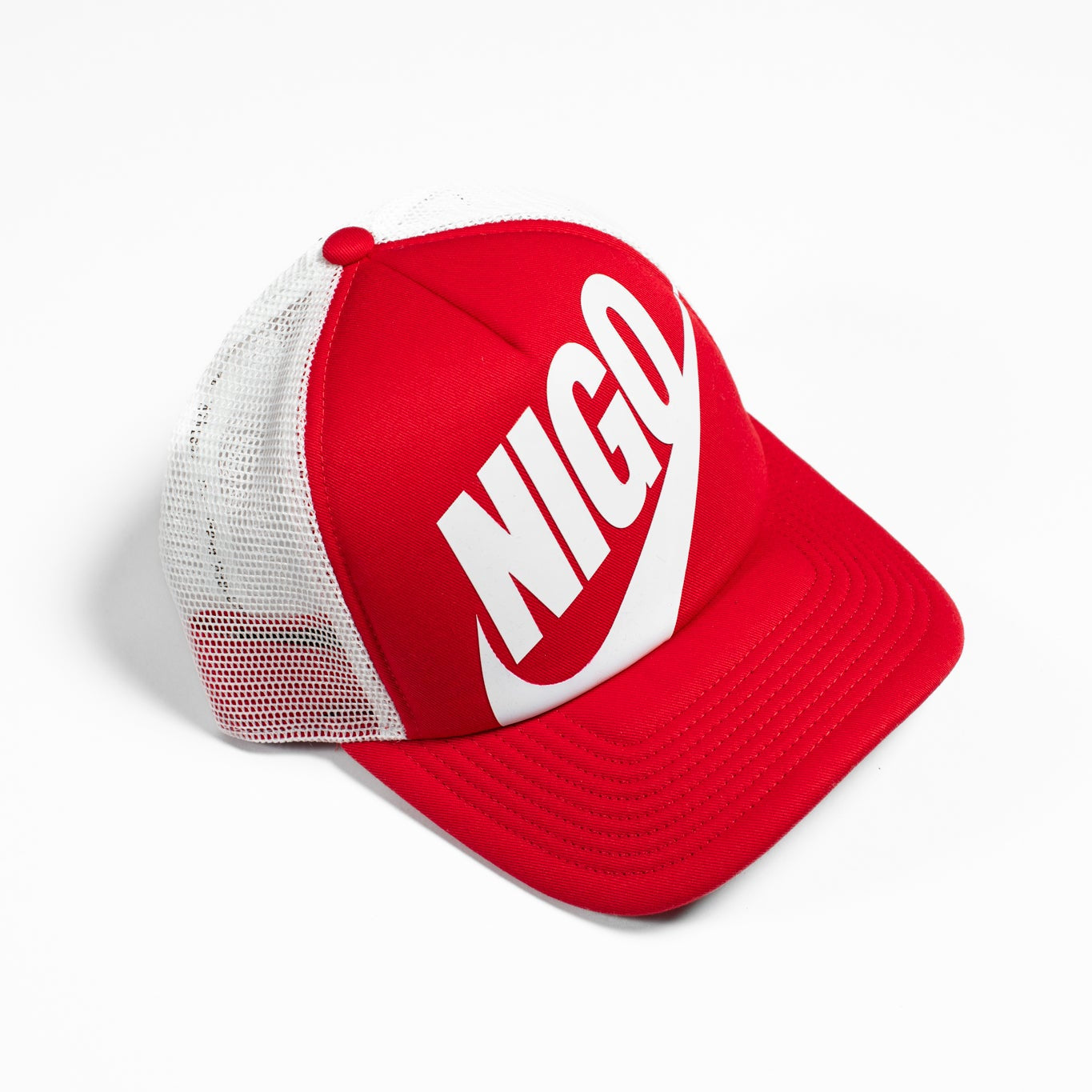 Red cap with white mesh back and 'NIGO' logo on a white background