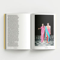 Inside page of the Offbeat Sari catalogue with a photograph of two people wearing saris.
