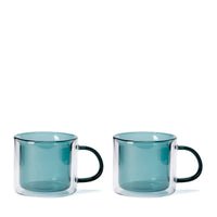 Conran shop Oslo blue/green double wall glass mug on white background, picture of 2 together.