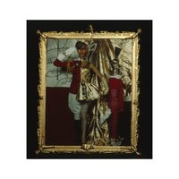 Person in formal attire with a gold frame