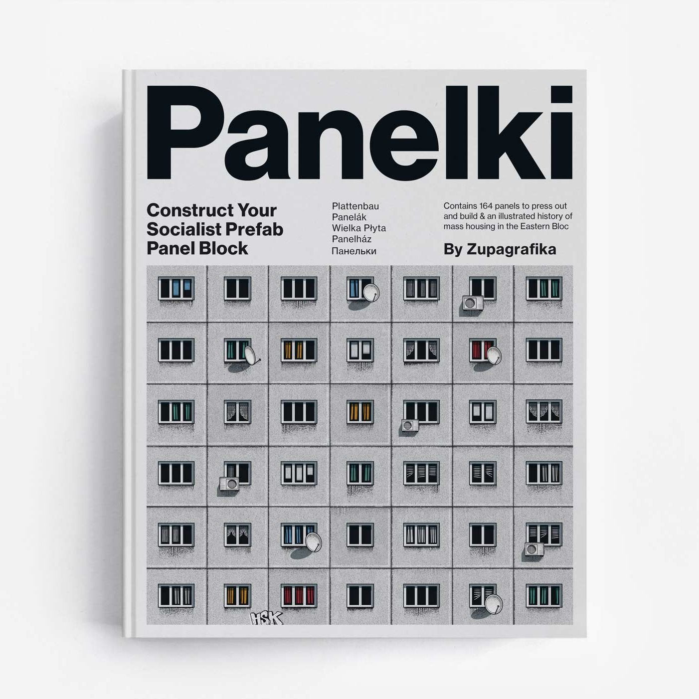 Cover of the book 'Panelki: Construct Your Socialist Prefab Panel Block' showing an illustration of a brutalist aparment building.