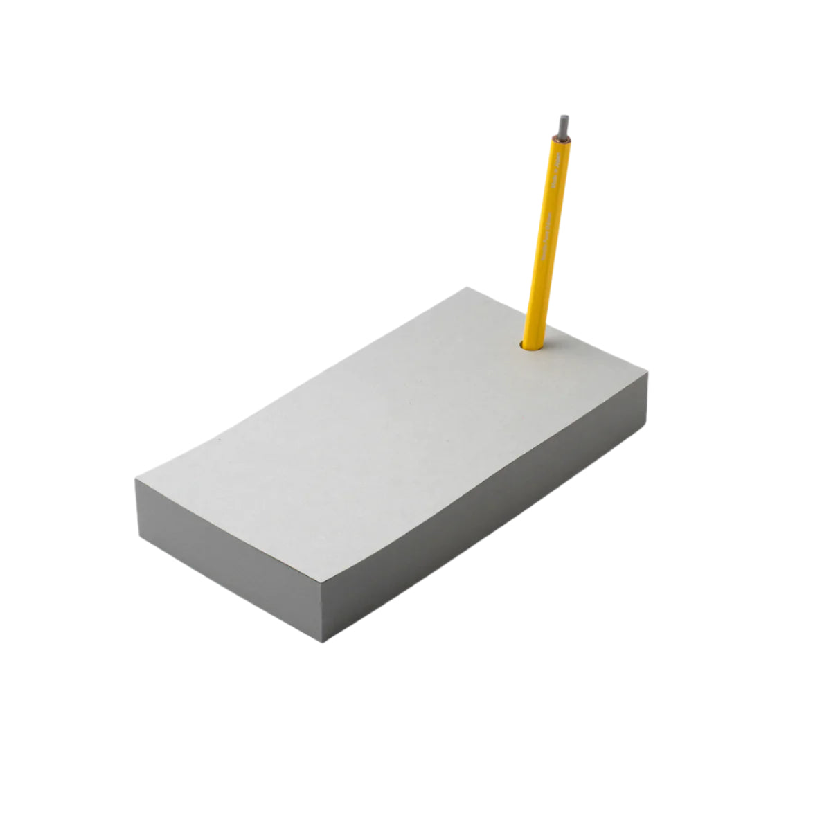 A gray notepad with a pen placed in the penstand on a white background.