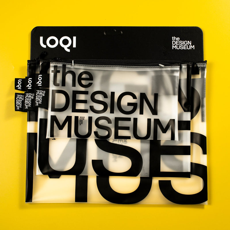 A clear zippered pouch with a black printed 'the DESIGN MUSEUM' graphic, attached to a black header card labeled 'LOQi' and 'the DESIGN MUSEUM', set against a solid bright yellow background.