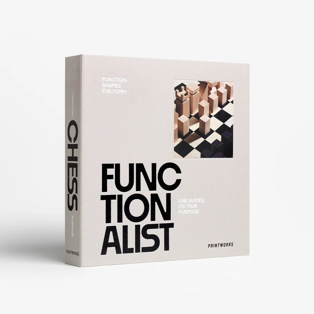 A chess set box in a warm off-white/cream color with bold black typography and a small chess-piece illustration 