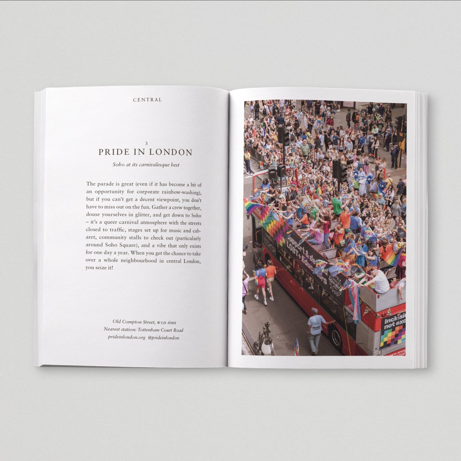 Open page of Queer London book featuring a photograph of London Pride parade with people waving colourful flags on a bus.