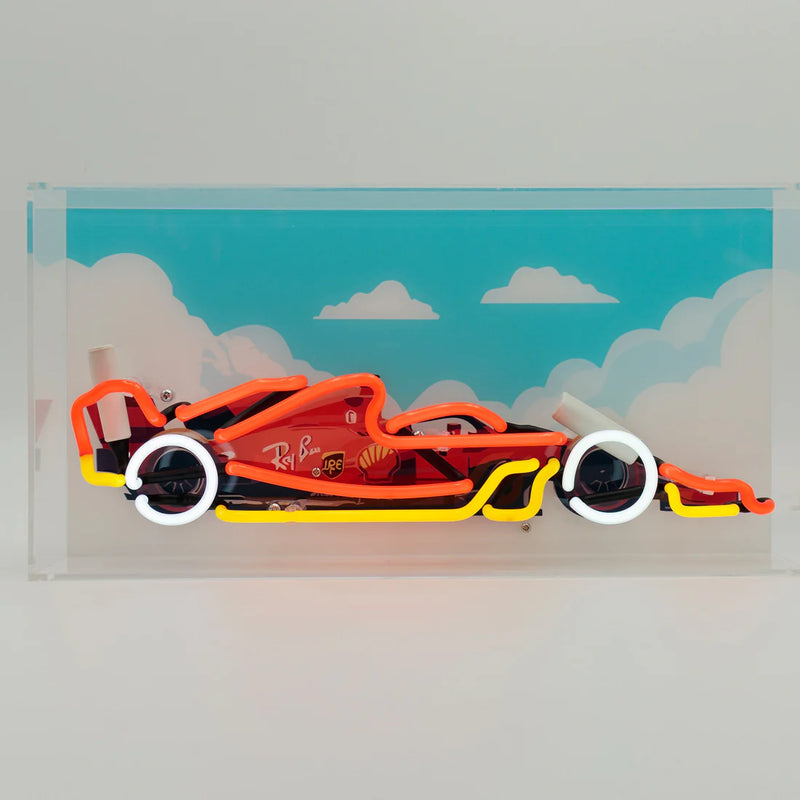 Futuristic car design on a transparent background with a blue sky and clouds.