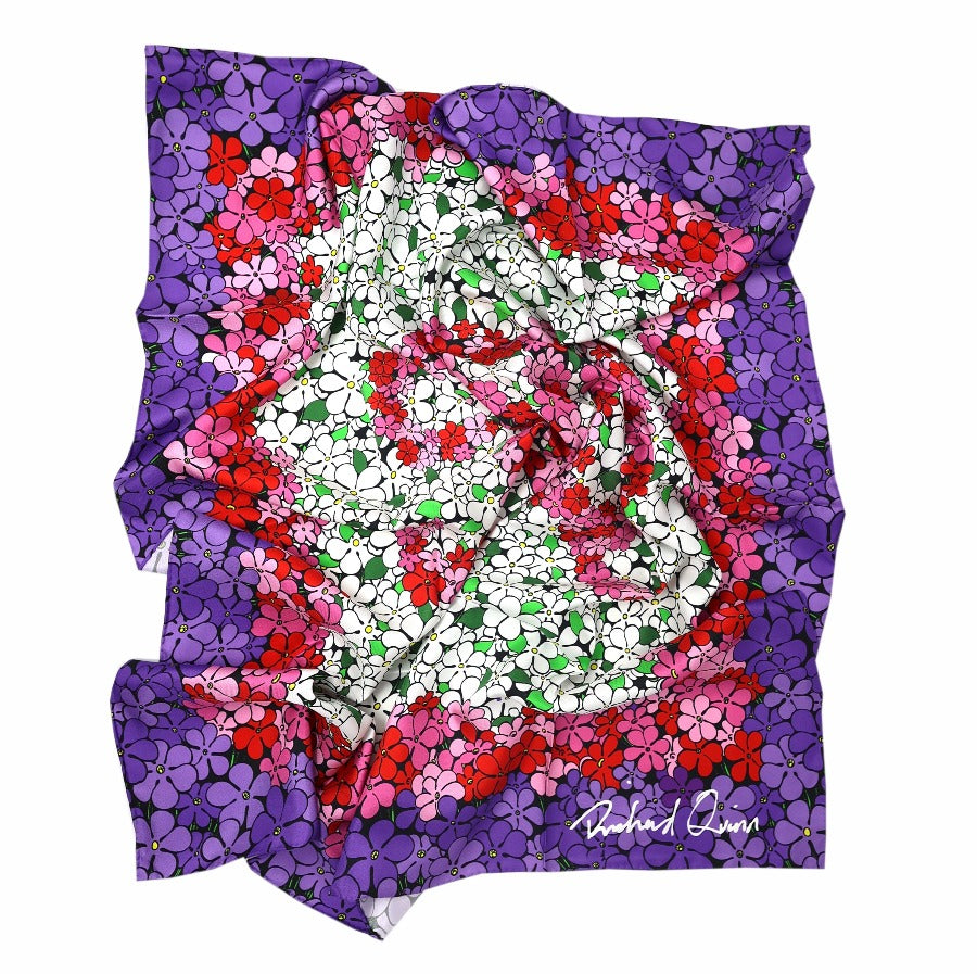 floral silk scarf scrunched up on a white background