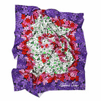 floral silk scarf scrunched up on a white background