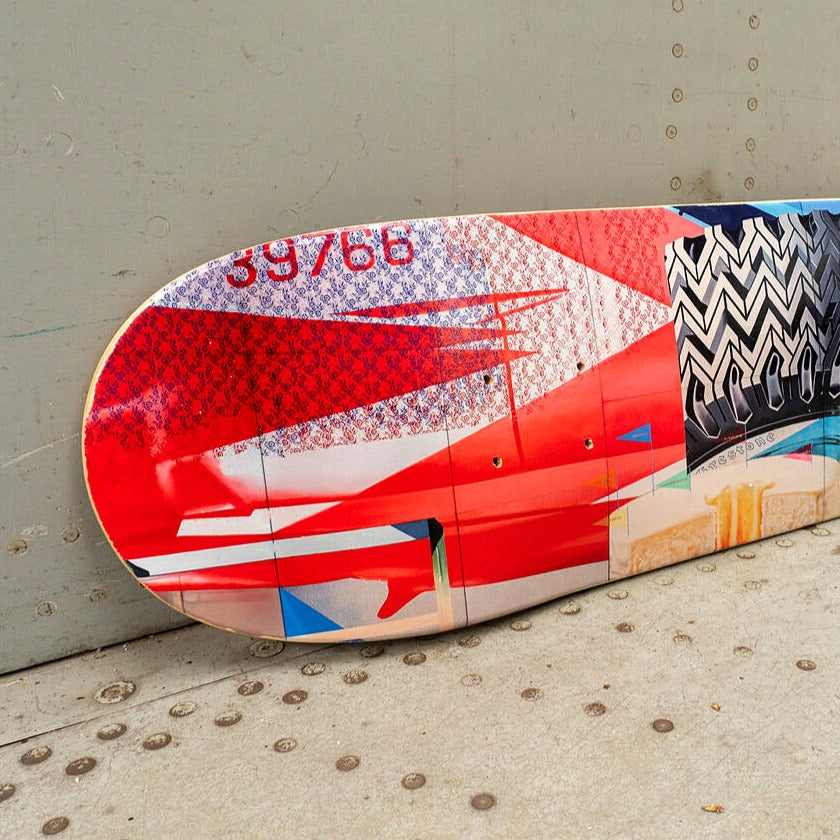closeup of skateboard on a metal surface