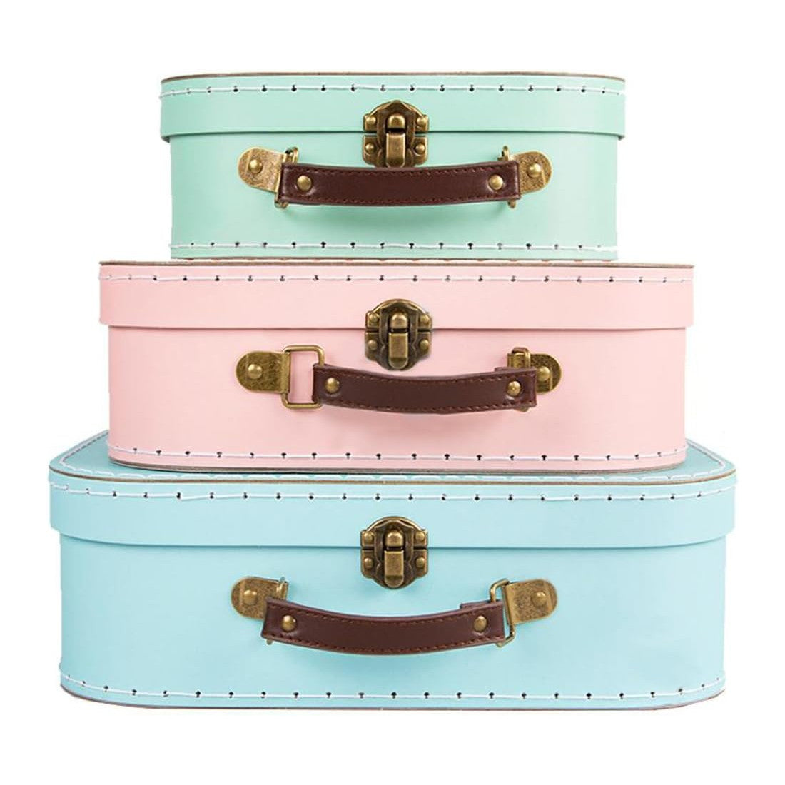 Three pastel-colored suitcases stacked on a white background