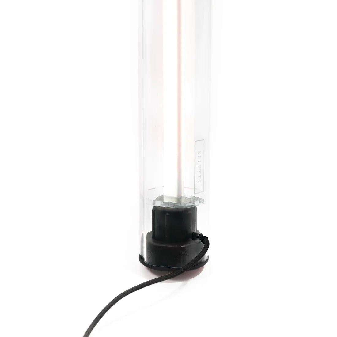 Bottom of black BIC pen lamp with black cable on a white background.