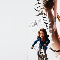 A tall rectangular poster or print featuring illustrated characters from a fantasy film: a woman in a long dress with black birds around her and a child riding a bicycle in the foreground. The print is photographed against a clean white background.
