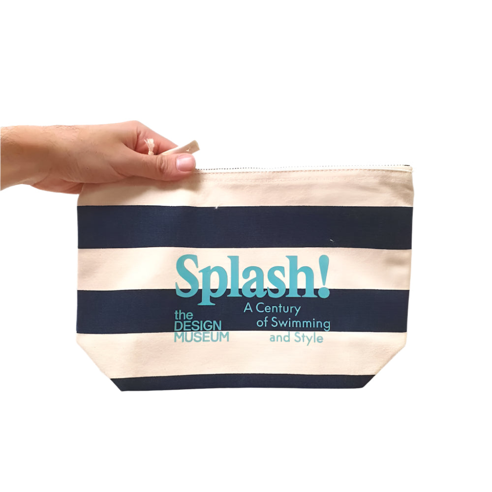 Splash Zip Pouch Navy Blue Stripe hold by a human hand on white background