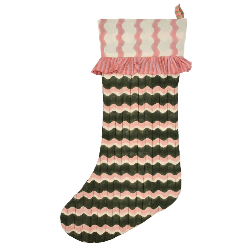 Striped Christmas stocking with pink and green pattern on a white background