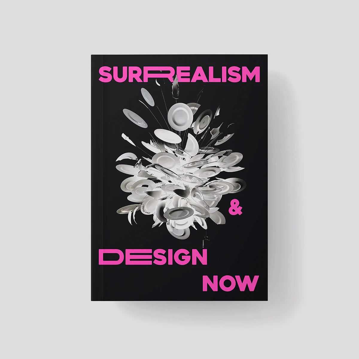 Black front cover of Surrealism & Design Now catalogue cover with pink text on a light grey background