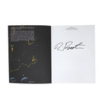 Picture of Tim Burton: Designing Worlds Exhibition Catalogue open preface page with Tim Burton's Signature (autograph) on a white background