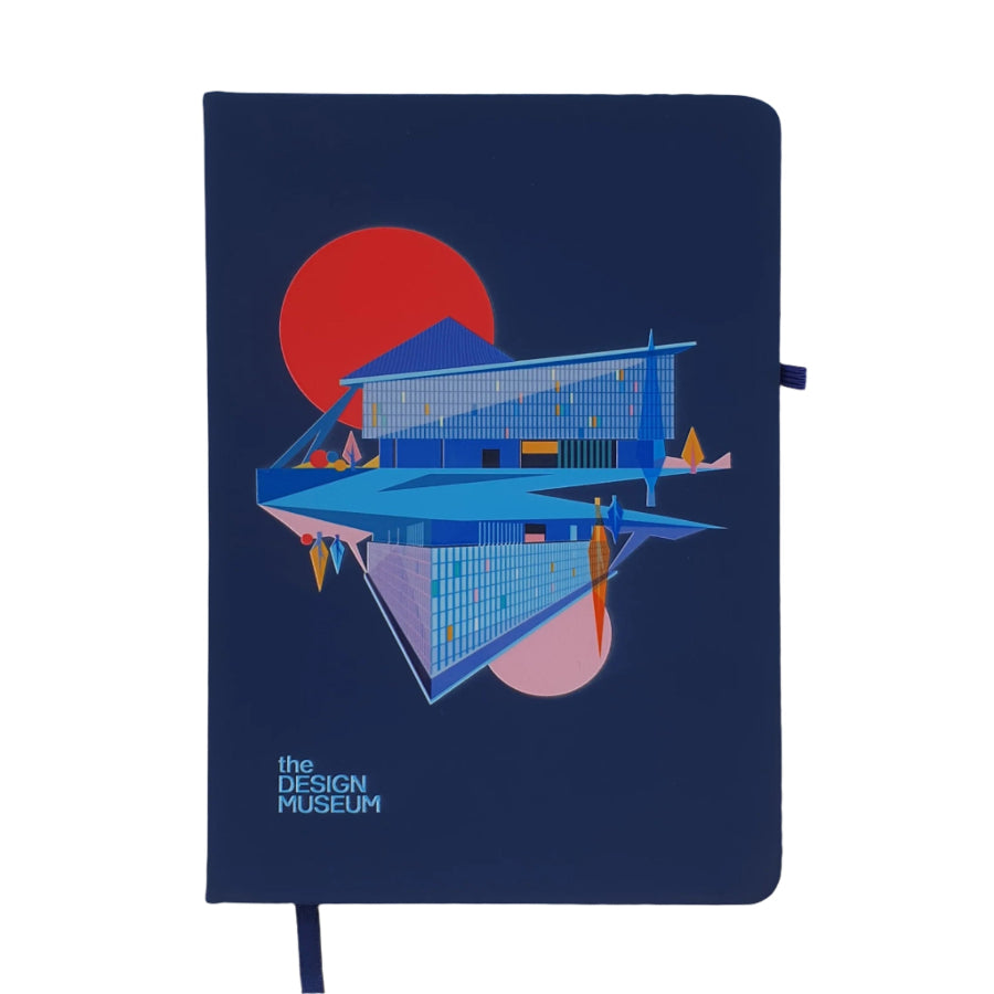 Front cover image of the Design Museum Branded A5 size notebook, the notebook hardback is navy blue with a colourful mirrored graphic image of the current design museum building, prior Commonwealth Institute, with a red sun on its background.
