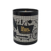 A black scented candle with a geometric pattern design, labeled 'the Design Museum Shop, EYVERMORE LONDON'.