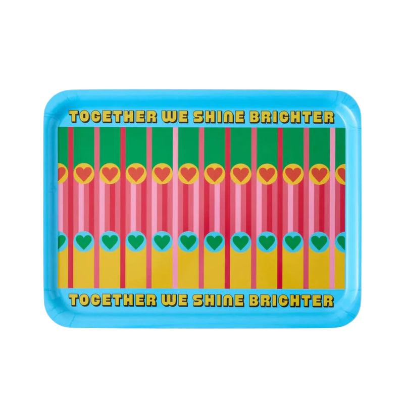 Colourful tray with heart patterns and 'Together We Shine Brighter' text on a light gray background