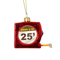 A Christmas bauble in the shape of a tape measure