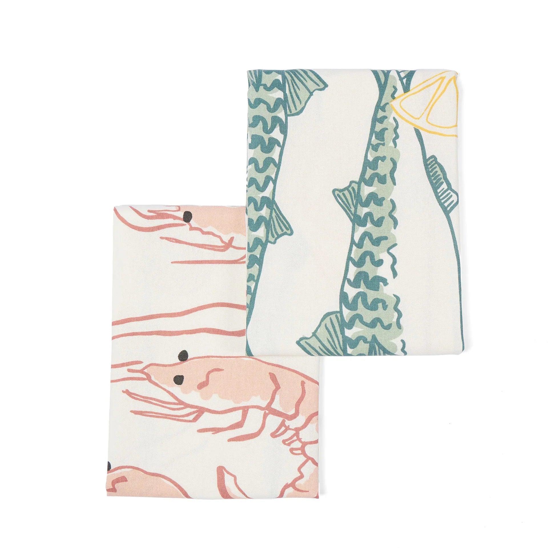 Two kitchen towels with fish and shrimp designs on a white background