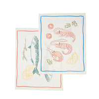 Two decorative towels with fish and shrimp designs on a white background