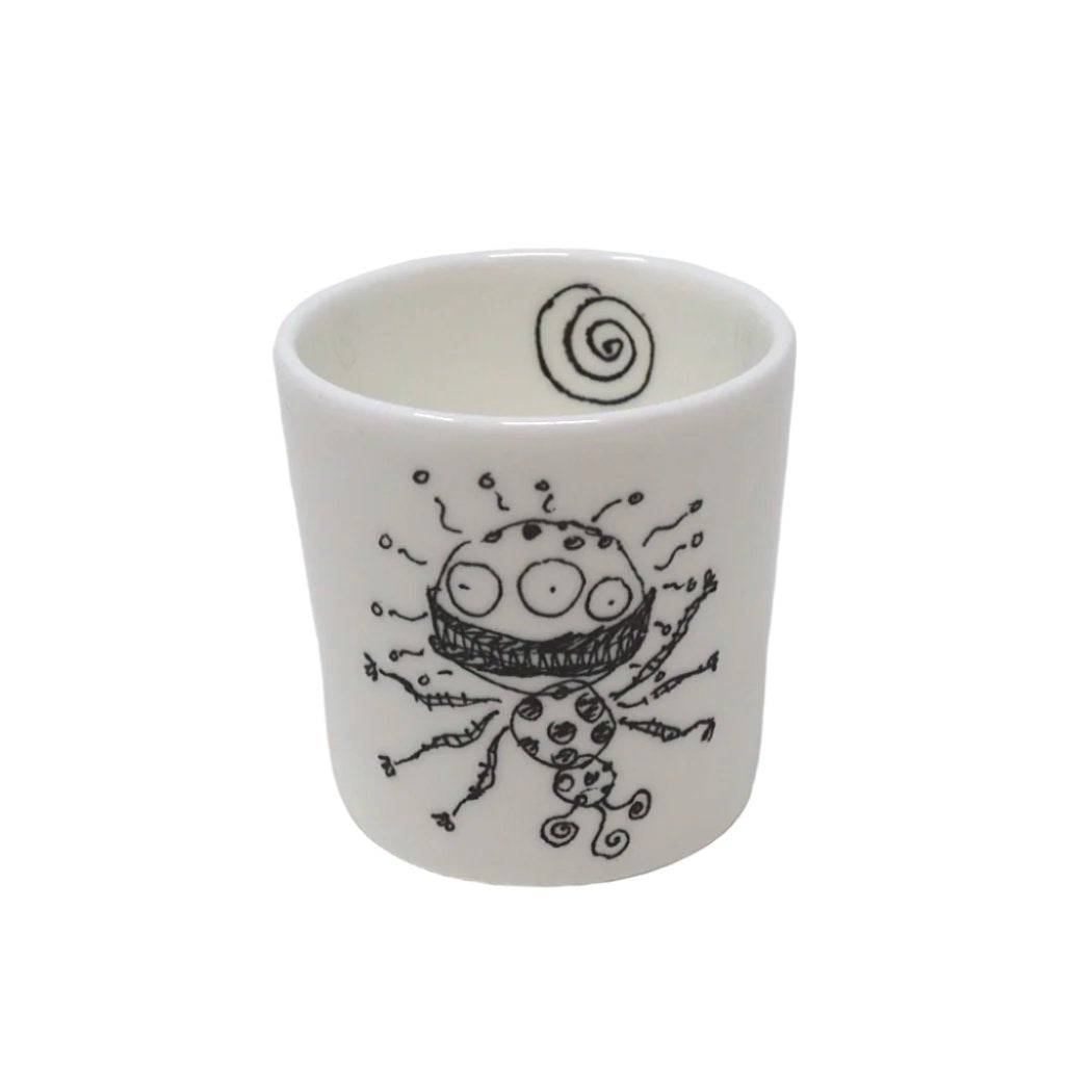 Fine bone china egg cup with a Tim Burton illustration on it