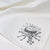 Tim Burton alien illustration white linen napkin close-up