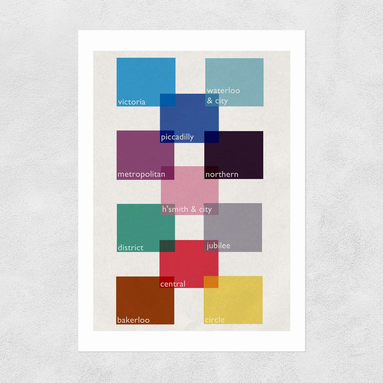 A colourful block print poster representing the tube grid of London Underground, with station names and colour blocks, on a white background.
