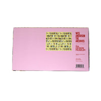 Pink box with Wes Anderson branding and design museum text on a white background