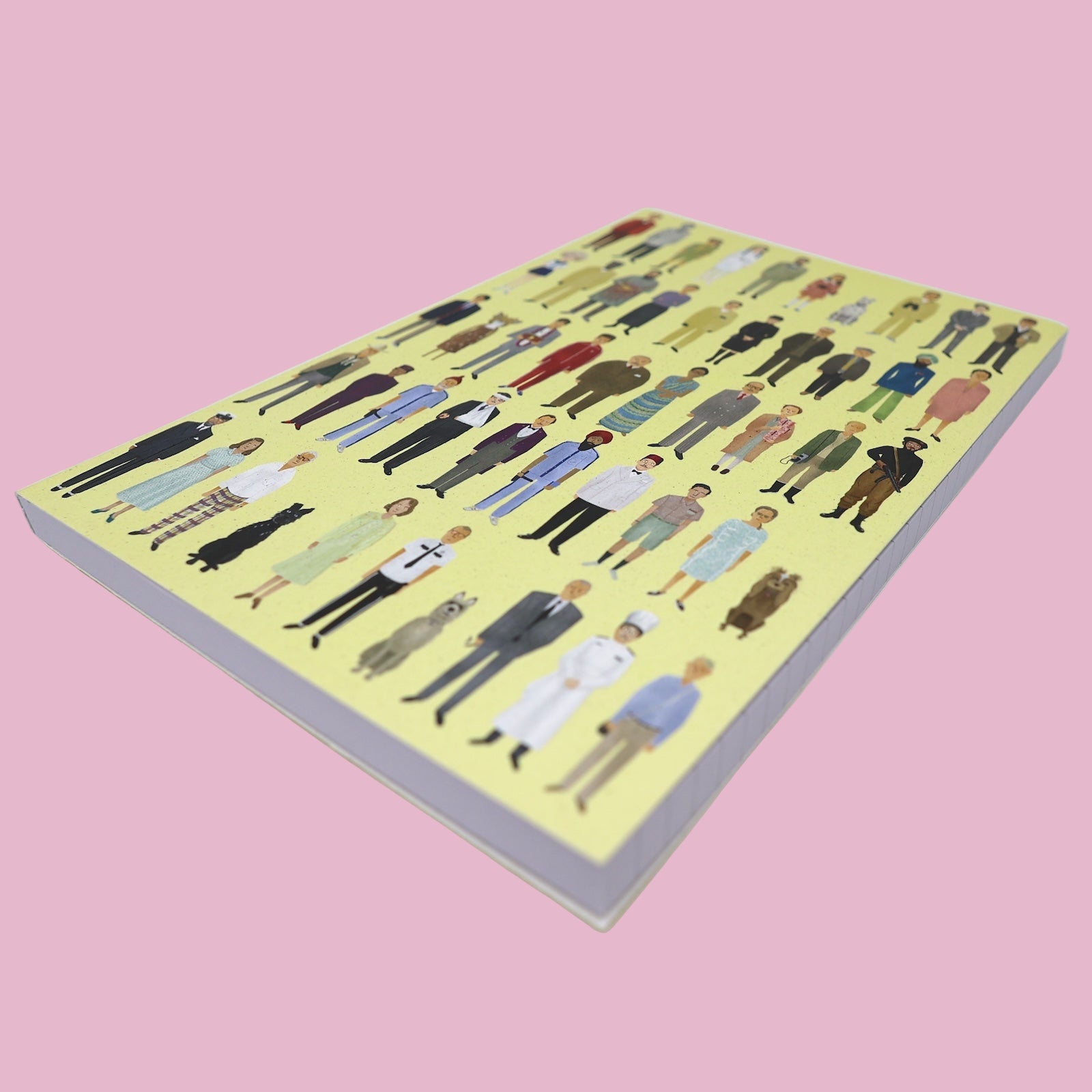 Notebook with illustrated people on a yellow background